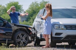 man-and-woman-arguing-after-a-car-accident