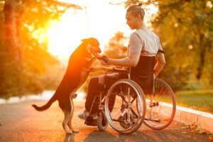 Young-man-with-dog-after-catastrophic-injury