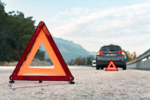 warning-triangle-back-of-car-on-the-road-accident-no-damage