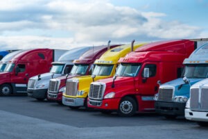 A row of semi-trucks. After a wreck, you can work with a Fort Lauderdale semi-truck accident lawyer.