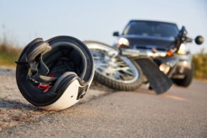 A motorcycle after an accident. Find out how much you should settle for after a motorcycle accident with our team.